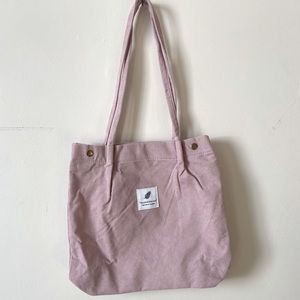 new in packaging pink corduroy ‘you need this one, take care of laundry…
